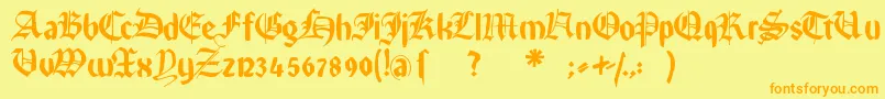 フォントRememberreinerfs – オレンジの文字が黄色の背景にあります。