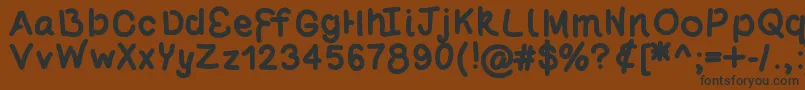 Poundcake69 Font – Black Fonts on Brown Background