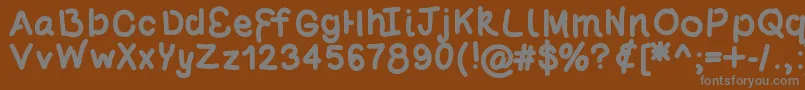 フォントPoundcake69 – 茶色の背景に灰色の文字