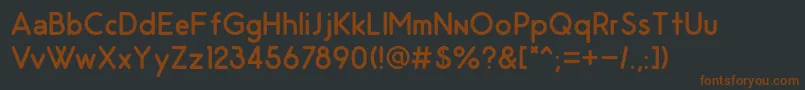 Czcionka OdinRoundedRegular – brązowe czcionki na czarnym tle
