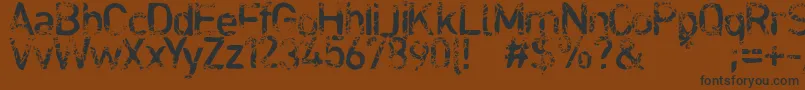 Blabloosy Font – Black Fonts on Brown Background