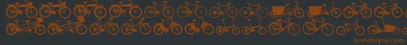 Bikes-Schriftart – Braune Schriften auf schwarzem Hintergrund