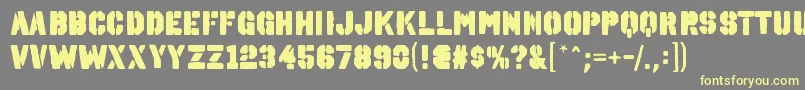 OctinspraypaintablRegular Font – Yellow Fonts on Gray Background