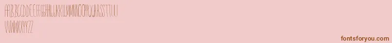 Yrface Font – Brown Fonts on Pink Background