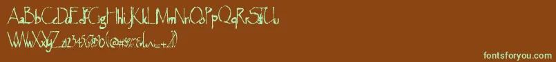 フォントMajorearthquake – 緑色の文字が茶色の背景にあります。