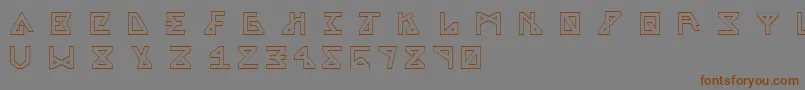 フォントAlphaOutline – 茶色の文字が灰色の背景にあります。