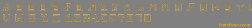 フォントAlphaOutline – オレンジの文字は灰色の背景にあります。