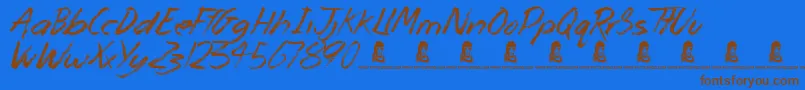 MonsterUnleashed Font – Brown Fonts on Blue Background