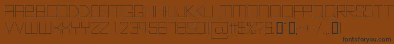 KubusThin-fontti – mustat fontit ruskealla taustalla