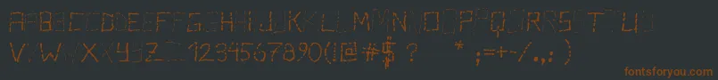 Шрифт PisStutter – коричневые шрифты на чёрном фоне