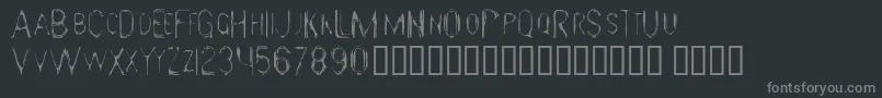 GloomyGus-fontti – harmaat kirjasimet mustalla taustalla