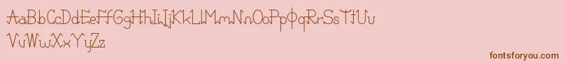 PixoDemo-fontti – ruskeat fontit vaaleanpunaisella taustalla