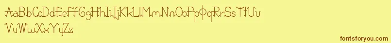 Шрифт PixoDemo – коричневые шрифты на жёлтом фоне