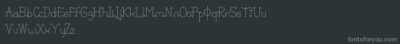 PixoDemo-fontti – harmaat kirjasimet mustalla taustalla