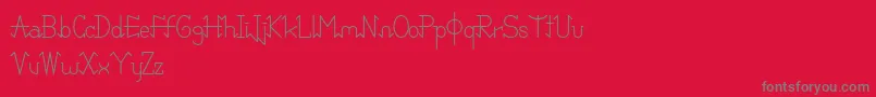 PixoDemo-fontti – harmaat kirjasimet punaisella taustalla