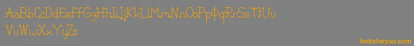 フォントPixoDemo – オレンジの文字は灰色の背景にあります。
