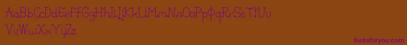 Czcionka PixoDemo – fioletowe czcionki na brązowym tle