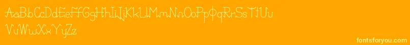 Czcionka PixoDemo – żółte czcionki na pomarańczowym tle