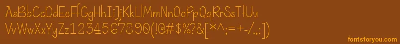 Rolande Font – Orange Fonts on Brown Background