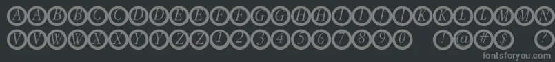 Garanitialrings Font – Gray Fonts on Black Background