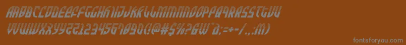 Zoneriderhalfital-fontti – harmaat kirjasimet ruskealla taustalla
