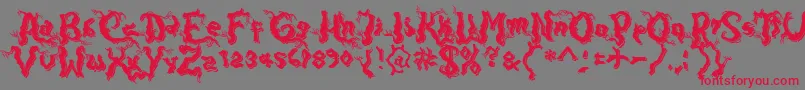 フォントDarkwoodShadow – 赤い文字の灰色の背景