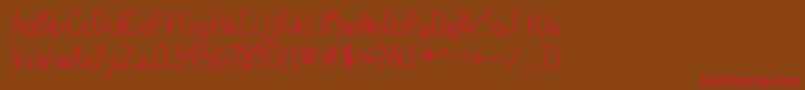 フォントKiddoSoup – 赤い文字が茶色の背景にあります。