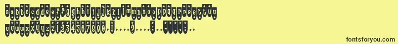 フォントPoptr – 黒い文字の黄色い背景