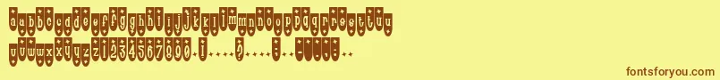 フォントPoptr – 茶色の文字が黄色の背景にあります。