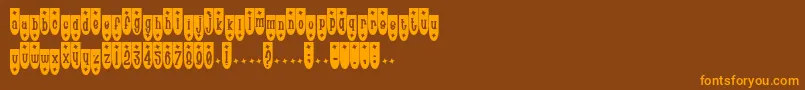フォントPoptr – オレンジ色の文字が茶色の背景にあります。
