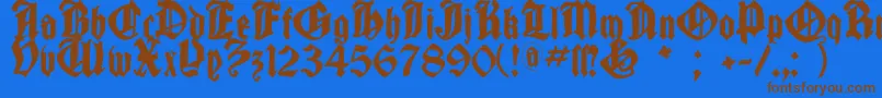 Cantaragotica-Schriftart – Braune Schriften auf blauem Hintergrund