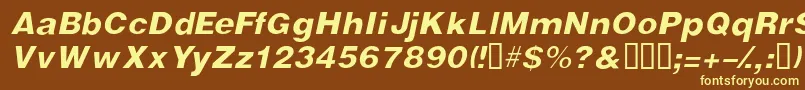 VivassskItalic-fontti – keltaiset fontit ruskealla taustalla