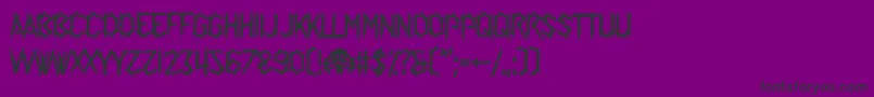 SpiderTalent-fontti – mustat fontit violetilla taustalla