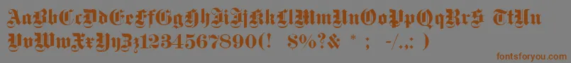 Dsfettegotisch-Schriftart – Braune Schriften auf grauem Hintergrund