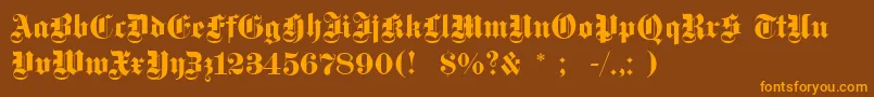 Dsfettegotisch-Schriftart – Orangefarbene Schriften auf braunem Hintergrund