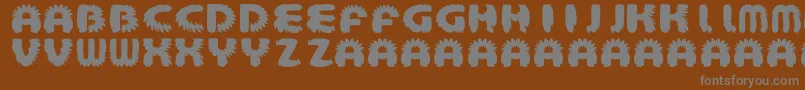 AztecBouffon Font – Gray Fonts on Brown Background