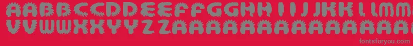 fuente AztecBouffon – Fuentes Grises Sobre Fondo Rojo