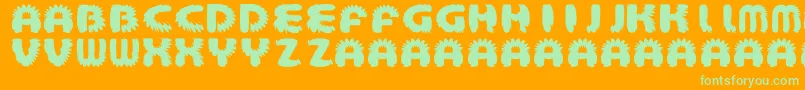 AztecBouffon-Schriftart – Grüne Schriften auf orangefarbenem Hintergrund