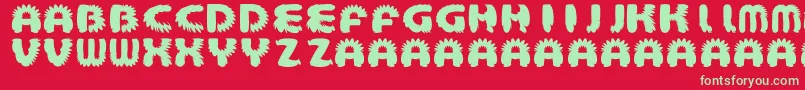 More about AztecBouffon Font AztecBouffon Font – Green Fonts on Red Background