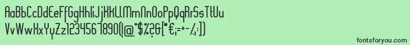 フォントSlimania – 緑の背景に黒い文字