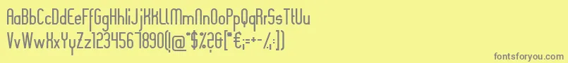 Slimania Font – Gray Fonts on Yellow Background