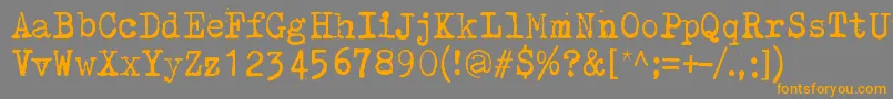 フォントWhyDoWeBlinkSoFrequentlyDark – オレンジの文字は灰色の背景にあります。