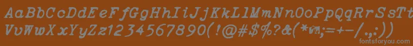 フォントOceansideTypewriter – 茶色の背景に灰色の文字