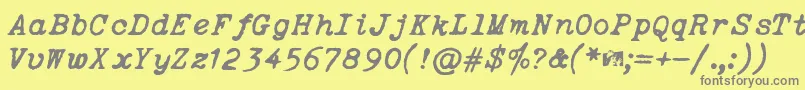 Fonte OceansideTypewriter – fontes cinzas em um fundo amarelo