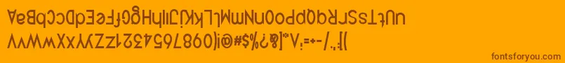 Fonte QuirkusUpsideDown – fontes marrons em um fundo laranja