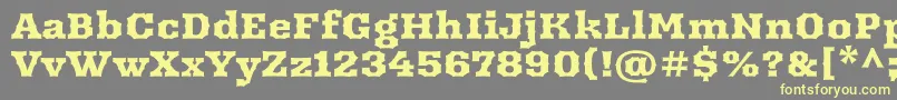 ArbutusRegular Font – Yellow Fonts on Gray Background