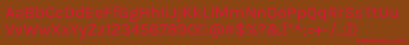 KarlaRegular Font – Red Fonts on Brown Background
