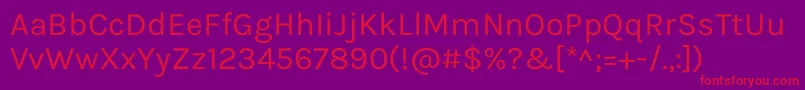 KarlaRegular-Schriftart – Rote Schriften auf violettem Hintergrund