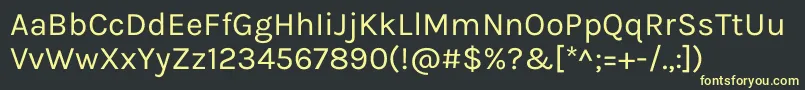 フォントKarlaRegular – 黒い背景に黄色の文字