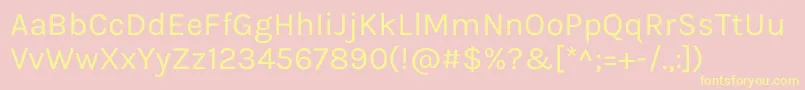 KarlaRegular-Schriftart – Gelbe Schriften auf rosa Hintergrund